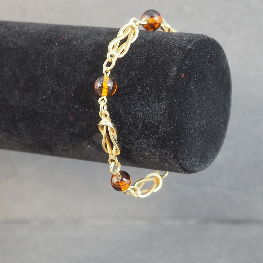 Avon Vintage Gold Tone Textured Knot Link Bracelet Amber Striped Resin Beads